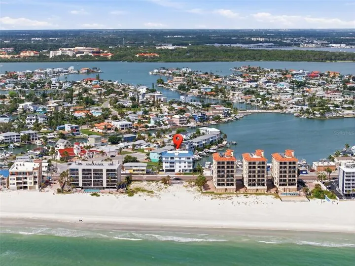 Aerial photo of Madeira Beach with the building marked between the Gulf and the bay